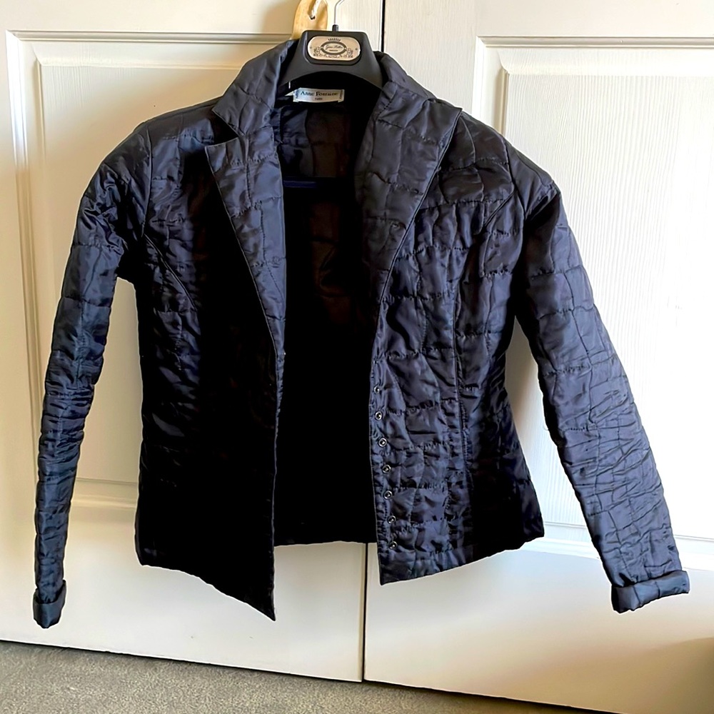 Lightweight quilted jacket. Made in France.  Snap front closures.